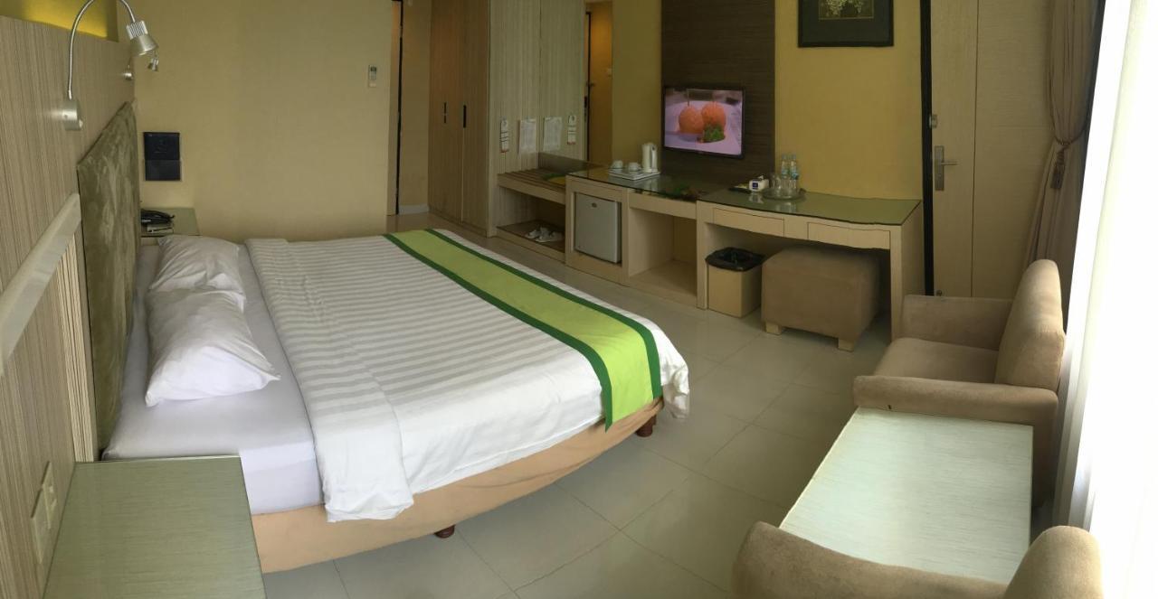 Hotel Wisata Niaga Пурвокерто Екстериор снимка